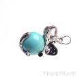 Collier pendentif éléphant en alliage boule turquoise avec pierres précieuses